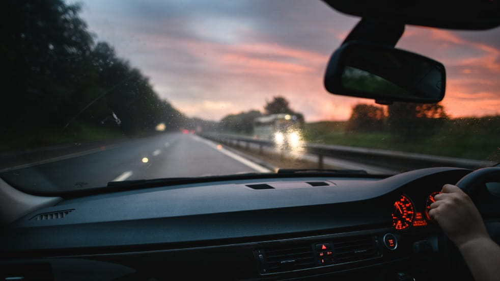 driving at sunset